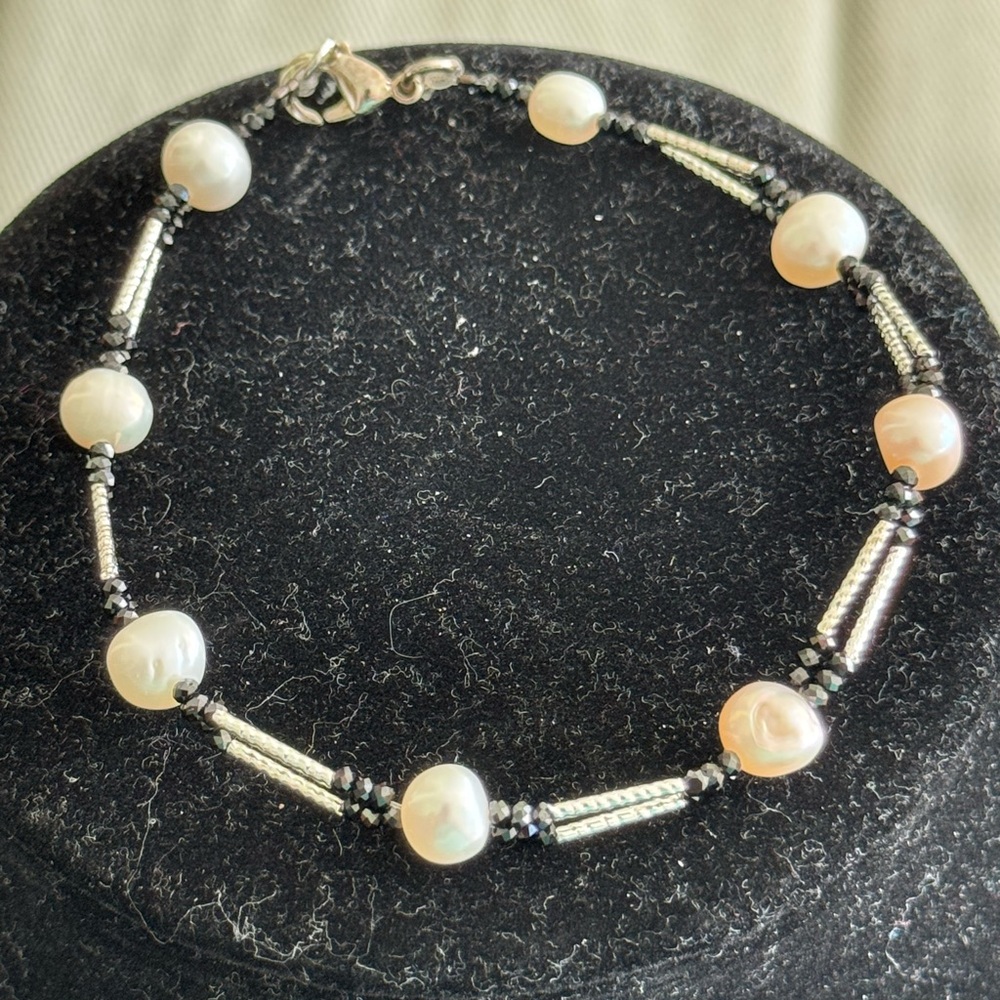 Elegant Pearl, double strand faceted onyx and Silver colored Beaded Bracelet.